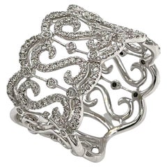 Wide 18K White Gold Ring with Repeating "S" Motif with Round Diamonds